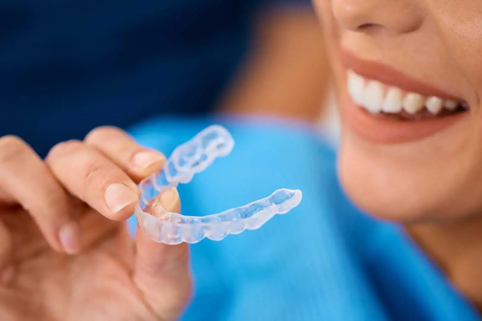 close-up-of-woman-using-invisible-silicone-dental-2026-01-06-10-28-33-utc
